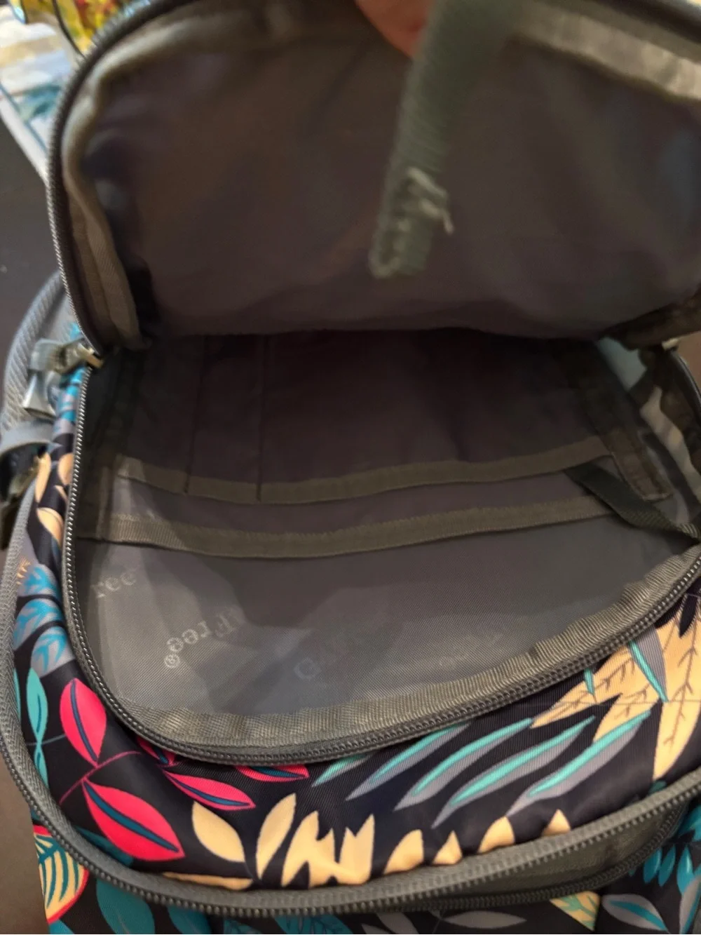 lug Navy Sling Backpack with Teal, Yellow, Pink & Cream Leaf Print